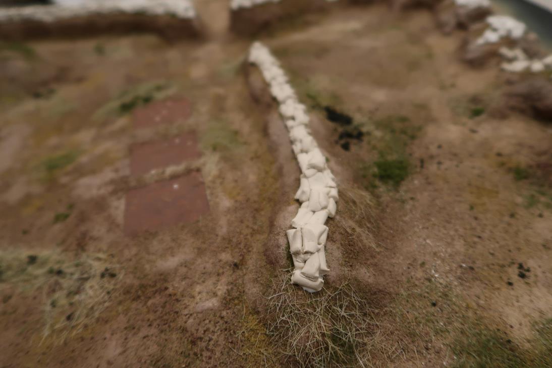 sandbags and static grass up close